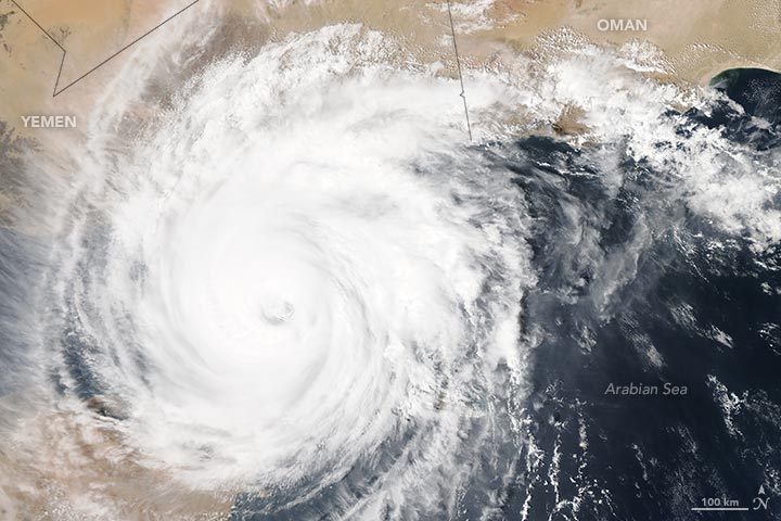 NASA MODIS Aqua satellite image of Cyclone Chapala over the Gulf of Aden, 2 November 2015 — a Category 4 hurricane spinning between Yemen and Oman, with its eye visible. Socotra Island lies just south of the frame, about to take direct landfall.
