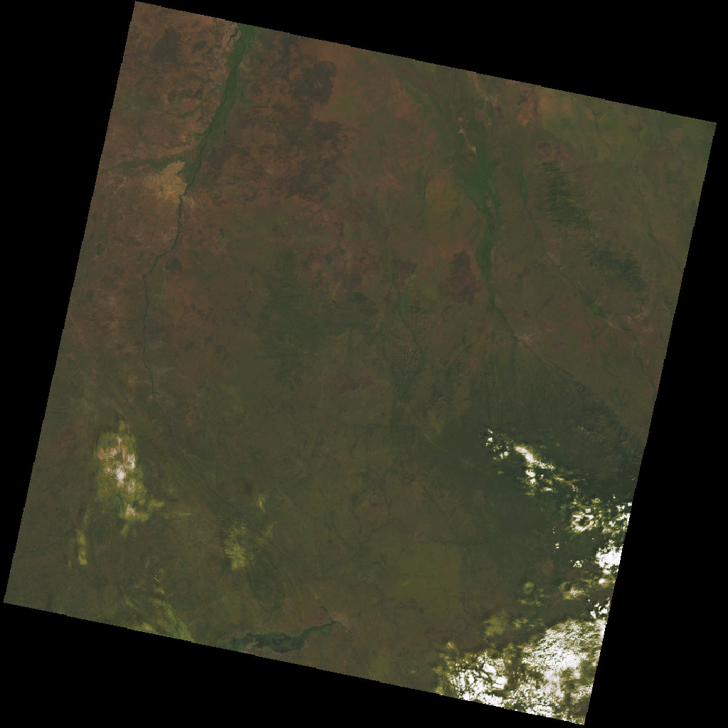 Landsat 8 satellite image of the Imatong Mountains, 13 December 2013 — two days before the civil war began. Dry-season palette: tan and brown lowlands with green riparian forest along river courses, dark forested Imatong massif in the upper right, scattered cloud in the lower right.